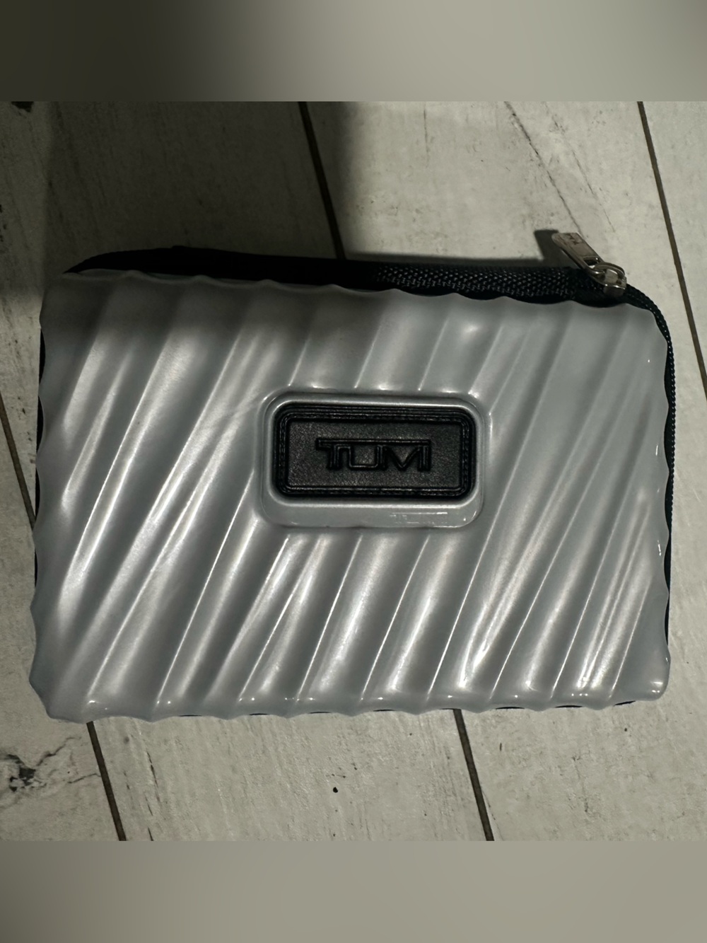 Tumi Metallic Silver Ridged Card Case with Black Trim Plastic Empty